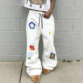 Vintage-style floral embroidered sweatpants