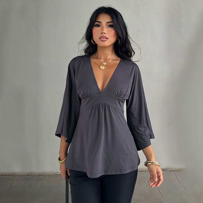 Deep V-neck high-waisted flared three-quarter sleeve top