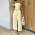 Striped strapless crop top and wide-leg trousers two-piece set