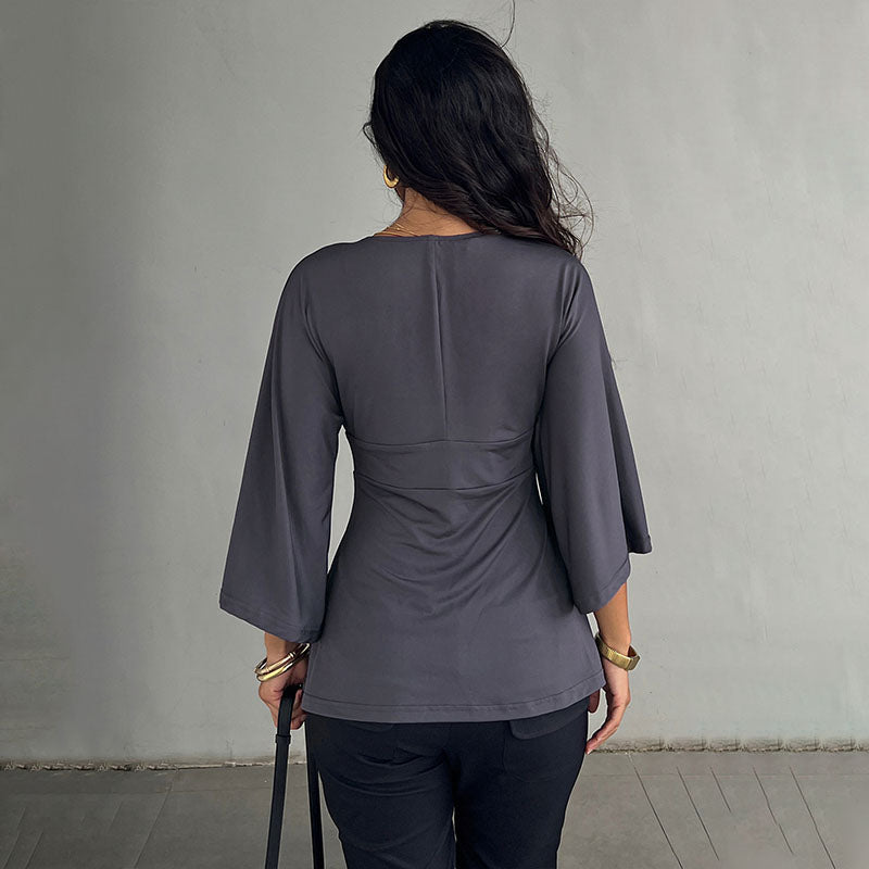 Deep V-neck high-waisted flared three-quarter sleeve top