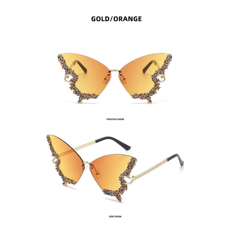 Butterfly-shaped sparkling rhinestone-rimmed sunglasses