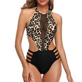 Mesh-paneled cutout halter-neck one-piece swimsuit