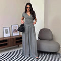Cross-neck top and wide-leg pants suit