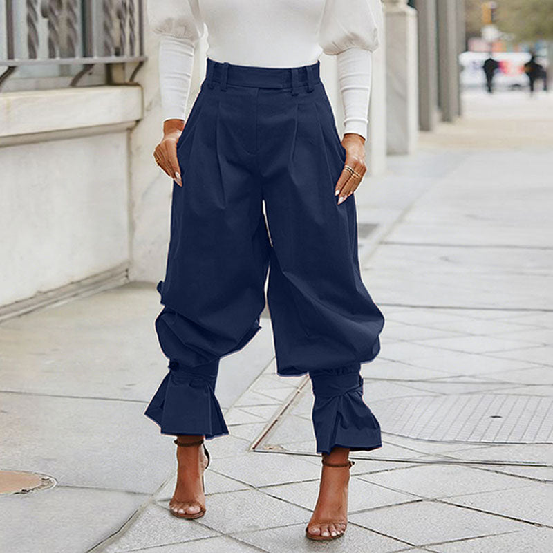 High-waisted loose-fit ruffled trousers